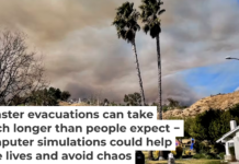 Wildfire smoke rises beyond homes near Castaic Lake as another California wildfire spread on Jan. 22, 2025. AP Photo/Marcio Jose Sanchez